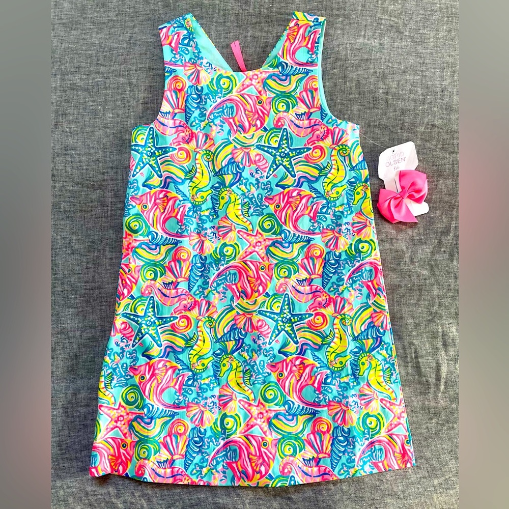 Girls sundress with tropical fish print and matching hair bow. New with tags.